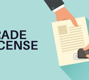 Illustration of a person stamping a trade license document on a teal background with bold 'TRADE LICENSE' text beside it.
